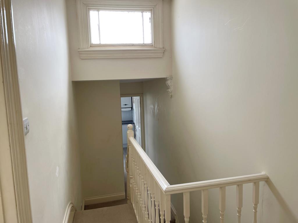 Lot: 23 - MIXED USE PART POSSESSION FOR INVESTMENT - view of landing with window and staircase